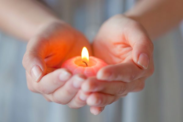 hands cupped candle flame TS 126448961, Order of Bards, Ovates & Druids.